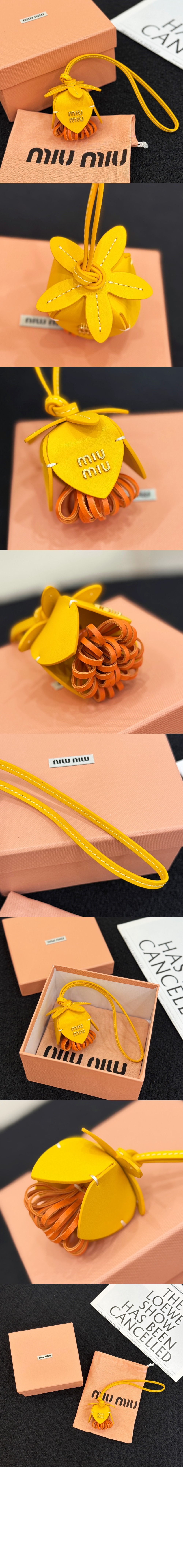 미우미우 가죽 트릭 5TL498