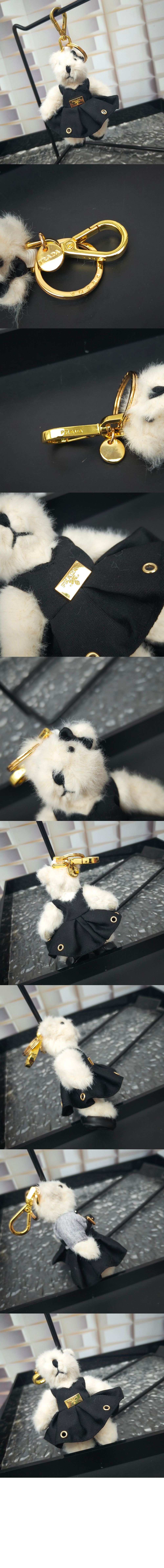 프라다 메탈 링이 달린 테디 백 참 1TO050